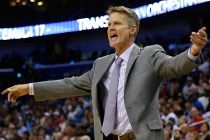 Golden State Warriors head coach Steve Kerr reacts during the second half of an NBA basketball game against the New Orleans Pelicans in New Orleans, Sunday, Dec. 14, 2014. The Warriors won 128-122 in overtime. (AP Photo/Jonathan Bachman)